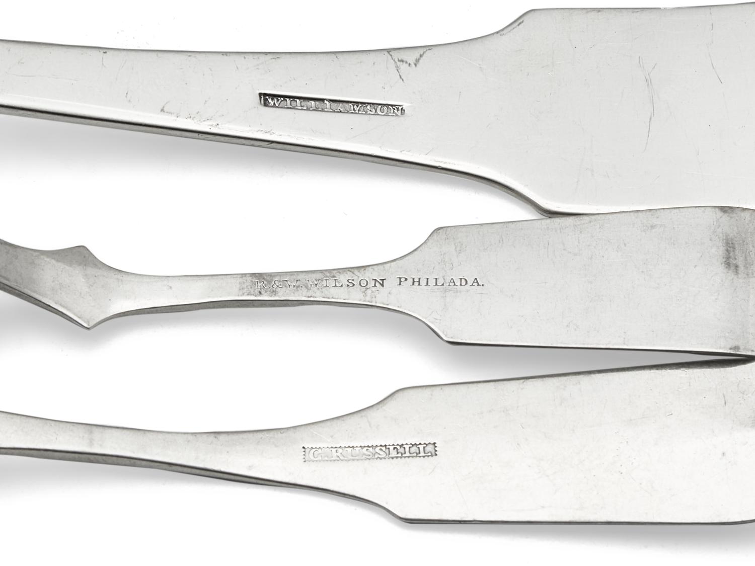 A Group of Eight Coin Silver Fiddle-Back Serving Articles
