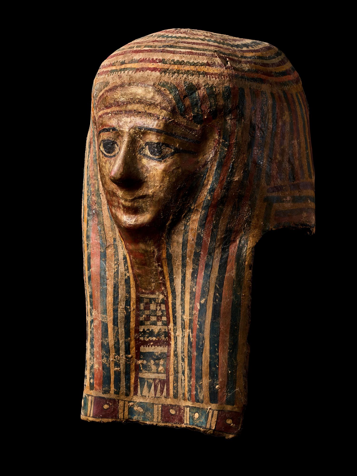 An Egyptian Cartonnage Mummy Mask