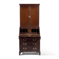 A George III Oak Desk and Bookcase