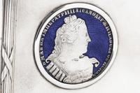 A Russian Silver and Enameled Coin-Inset Table-Top Cigarette Box
