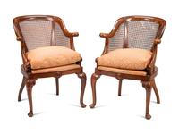 A Pair of English Walnut Barrel-Back Armchairs