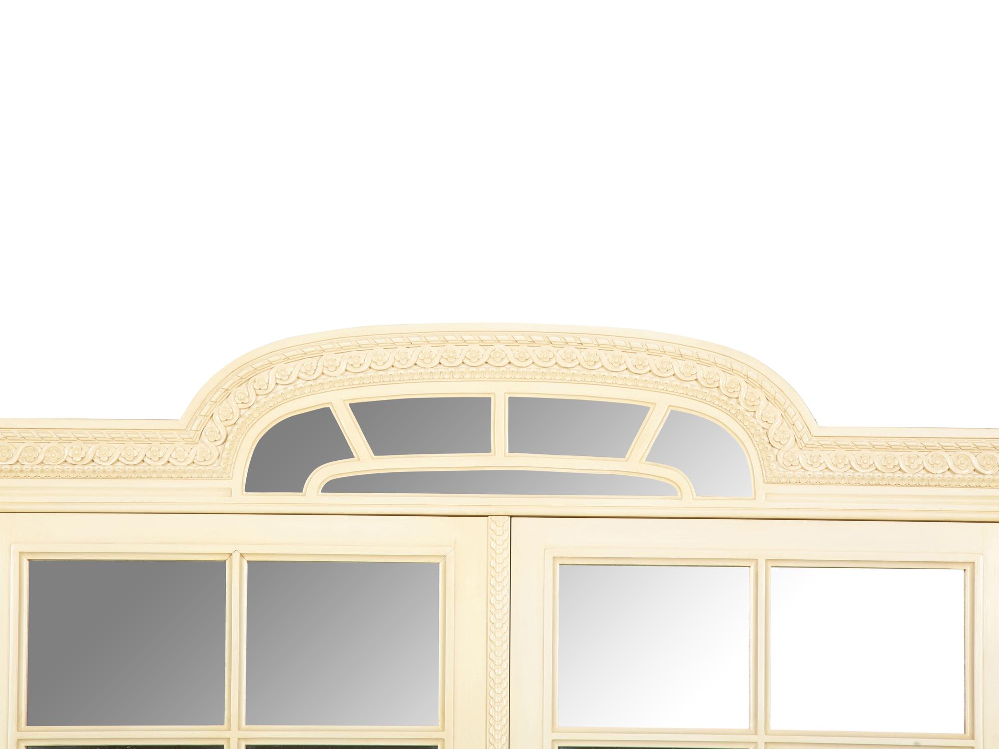 A Louis XVI Style White Painted Four-Door Armoire by Julia Gray, New York
