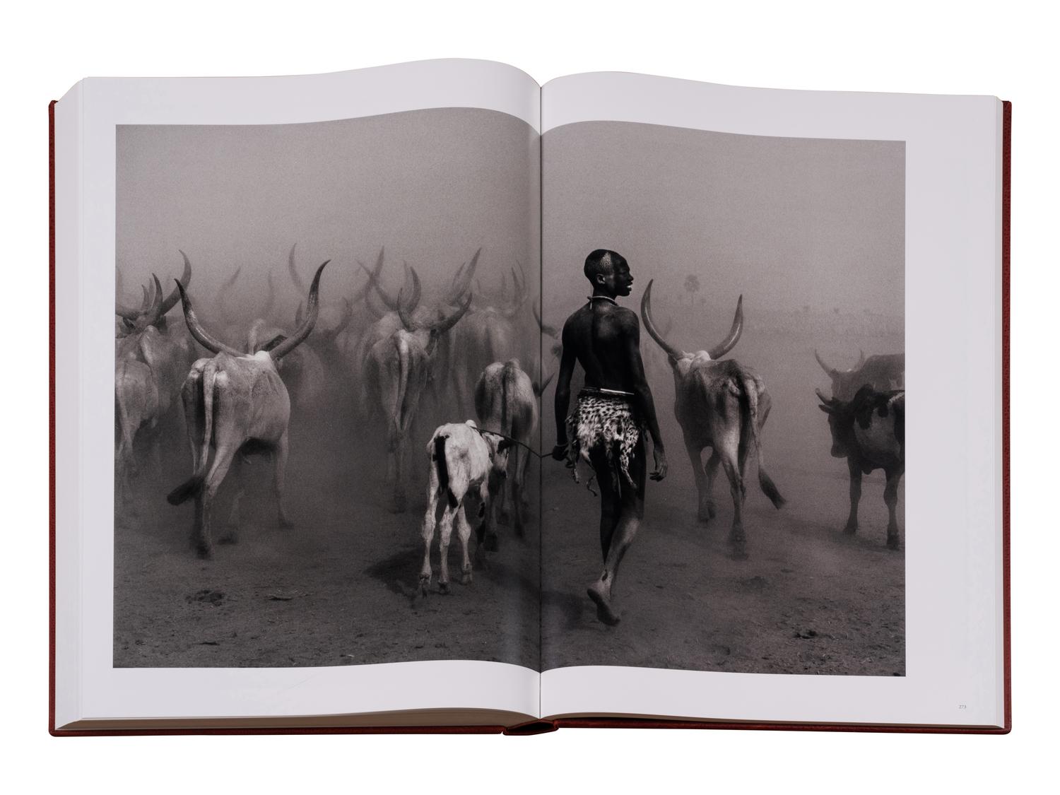 Genesis: Art Edition, Taschen, Paris 2013 (SUMO in two volumes together with booklet, varnished cherry wood lectern designed by Tadao Ando, and signed gelatin silver print Two Mursi Women, Omo Valley, Ethiopia )