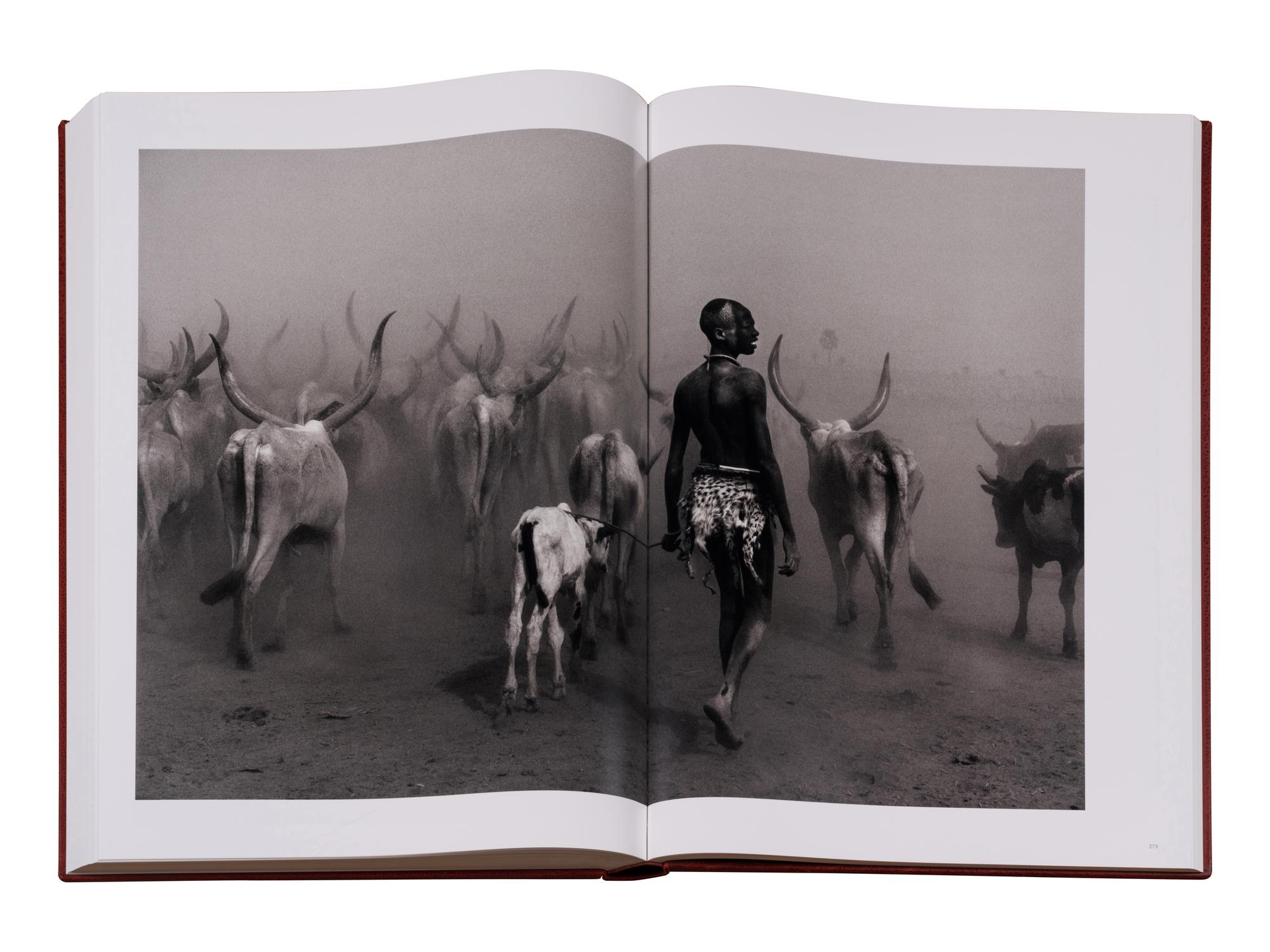 Genesis: Art Edition, Taschen, Paris 2013 (SUMO in two volumes together with booklet, varnished cherry wood lectern designed by Tadao Ando, and signed gelatin silver print Two Mursi Women, Omo Valley, Ethiopia )