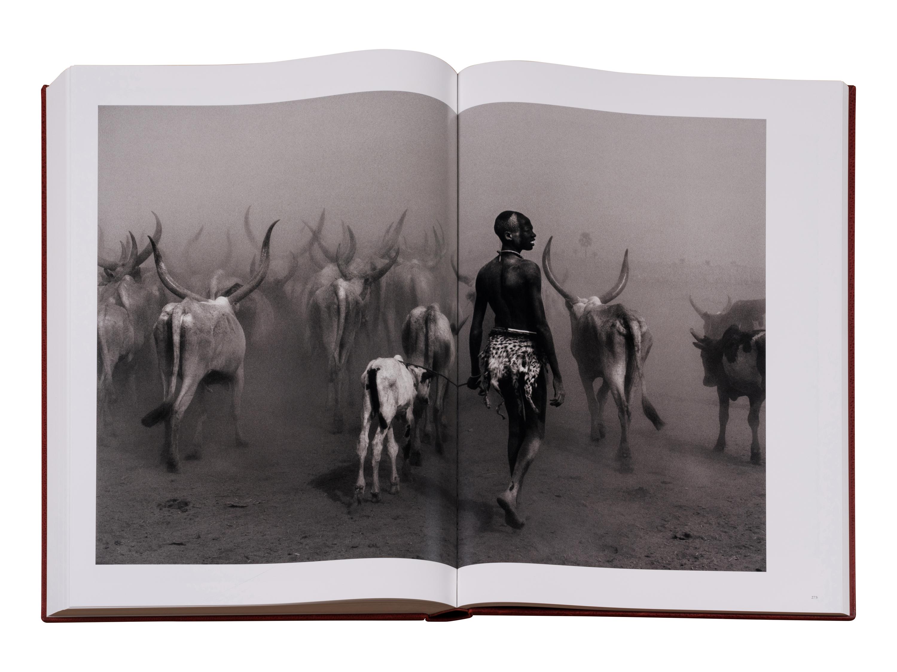 Genesis: Art Edition, Taschen, Paris 2013 (SUMO in two volumes together with booklet, varnished cherry wood lectern designed by Tadao Ando, and signed gelatin silver print Two Mursi Women, Omo Valley, Ethiopia )