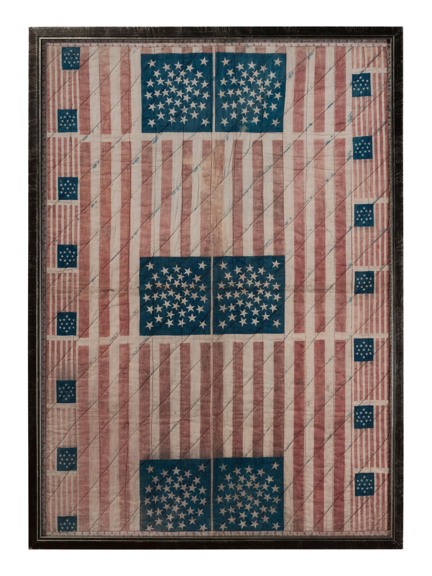 A Pieced Cotton Crib Quilt of Patriotic Bunting