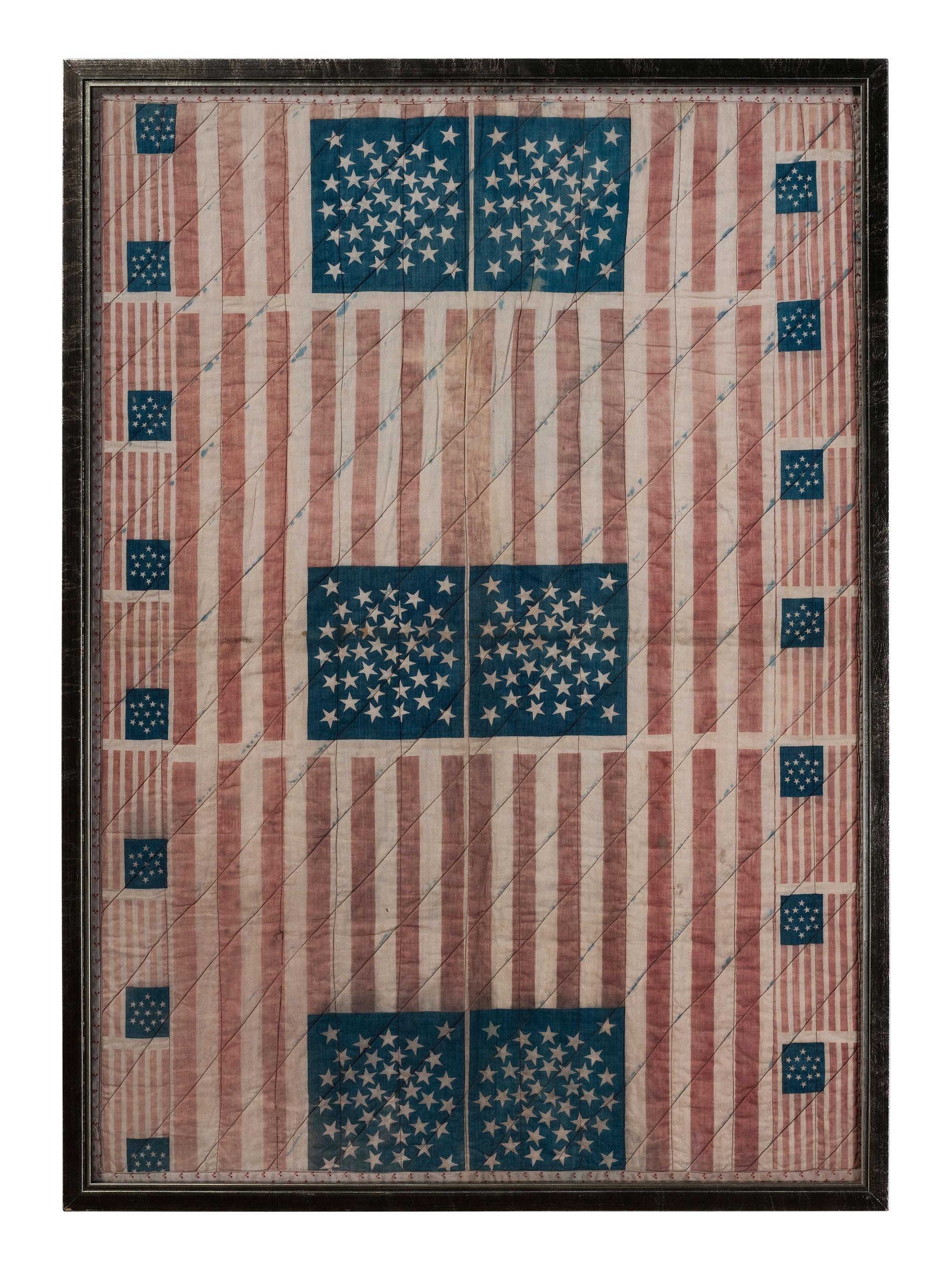 A Pieced Cotton Crib Quilt of Patriotic Bunting