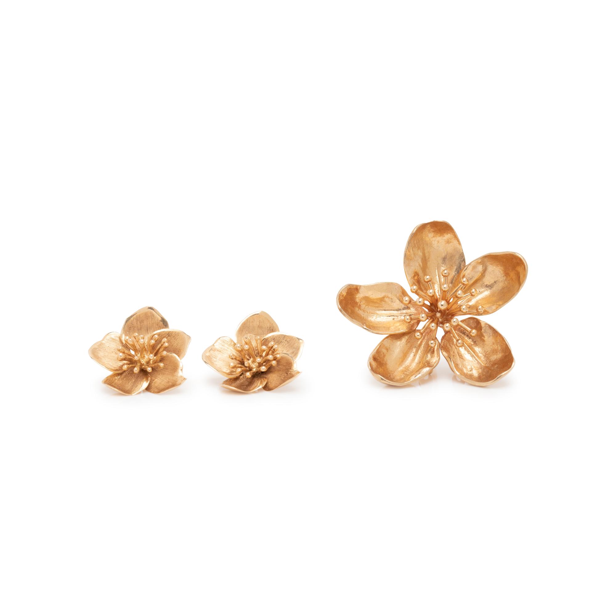 COLLECTION OF YELLOW GOLD FLOWER JEWELRY