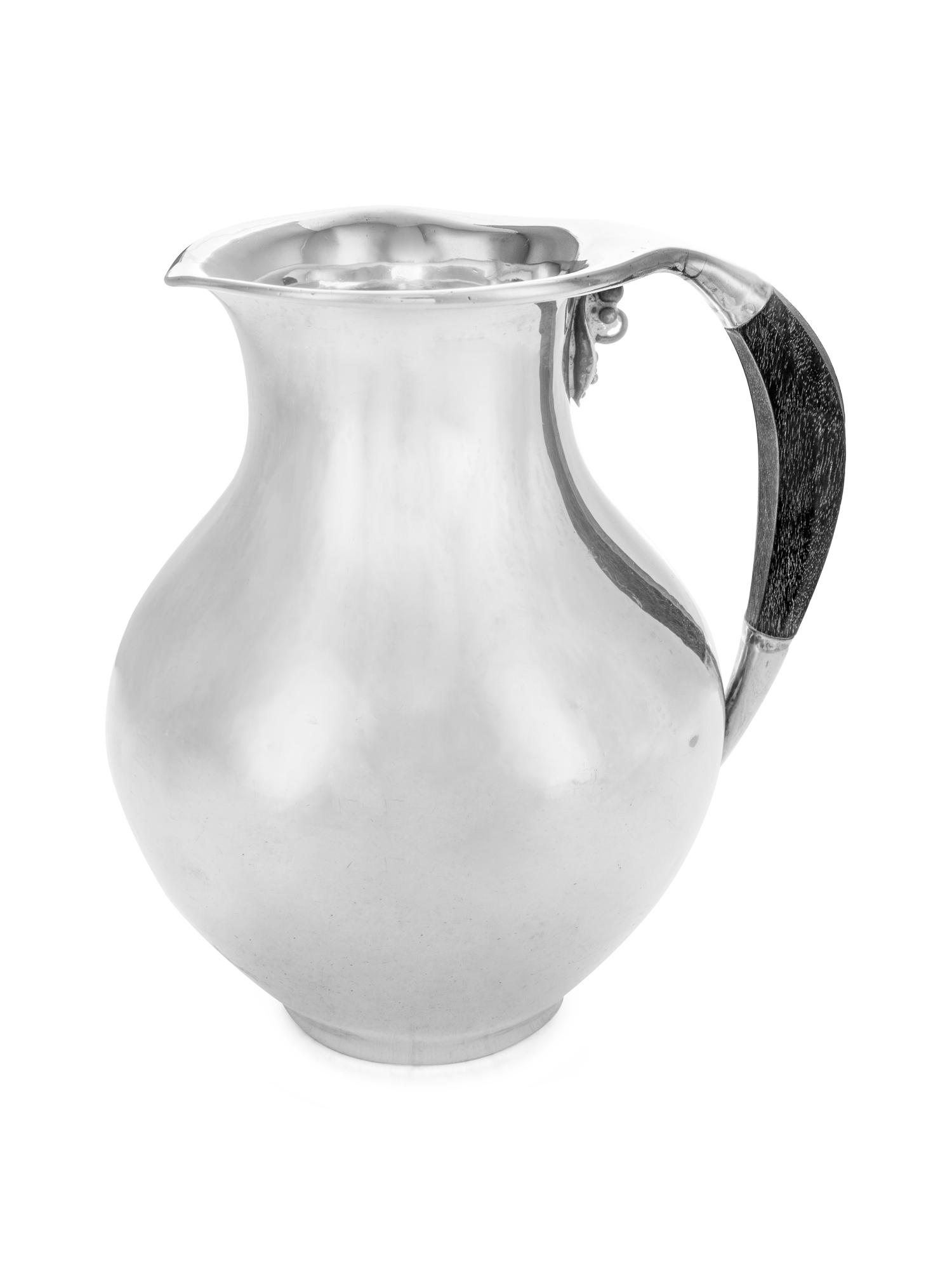 A Danish Silver Water Pitcher Item 87 on original listing.