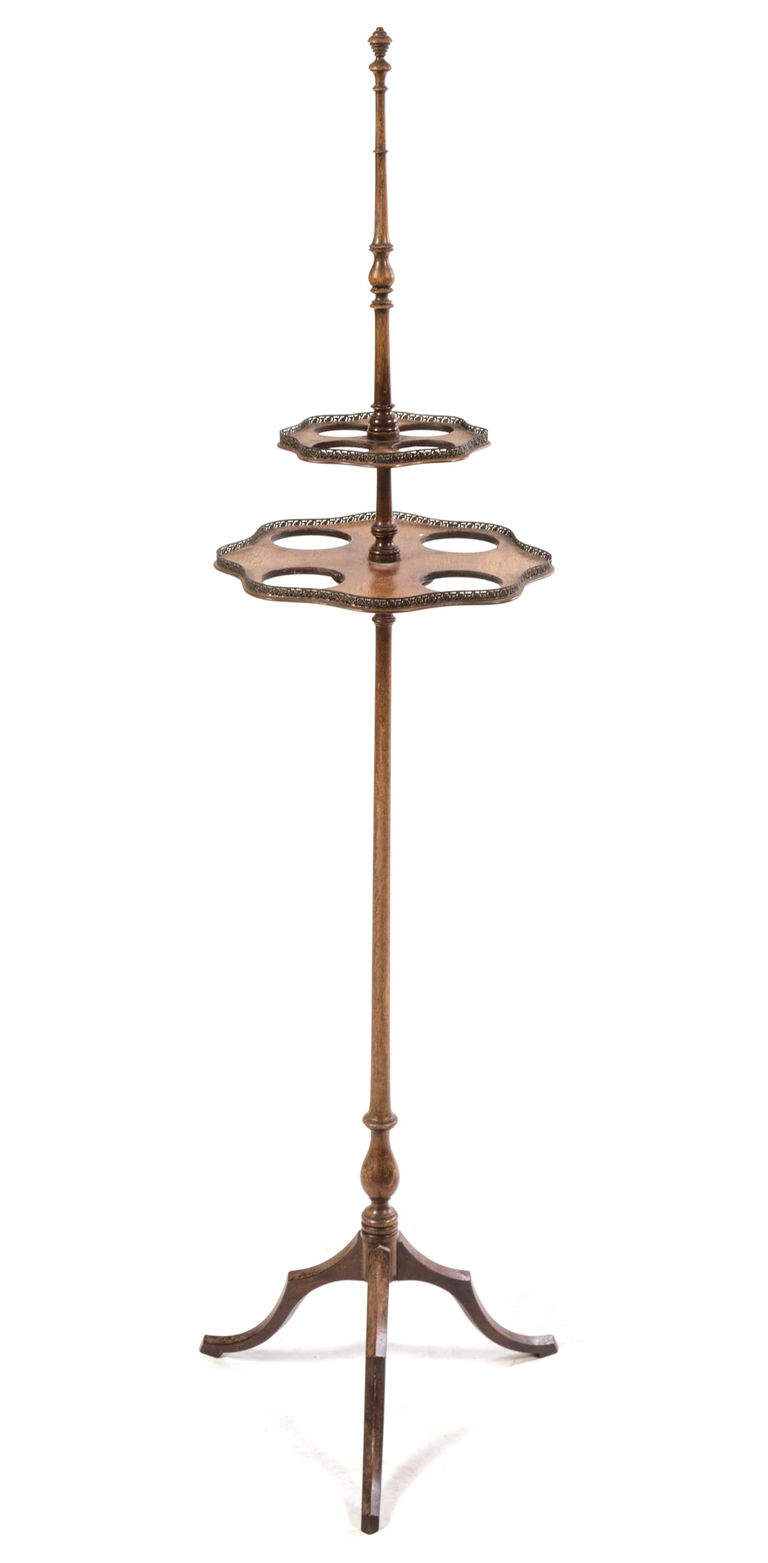 A Tripod Serving Stand. Height 57 1/4 inches.
