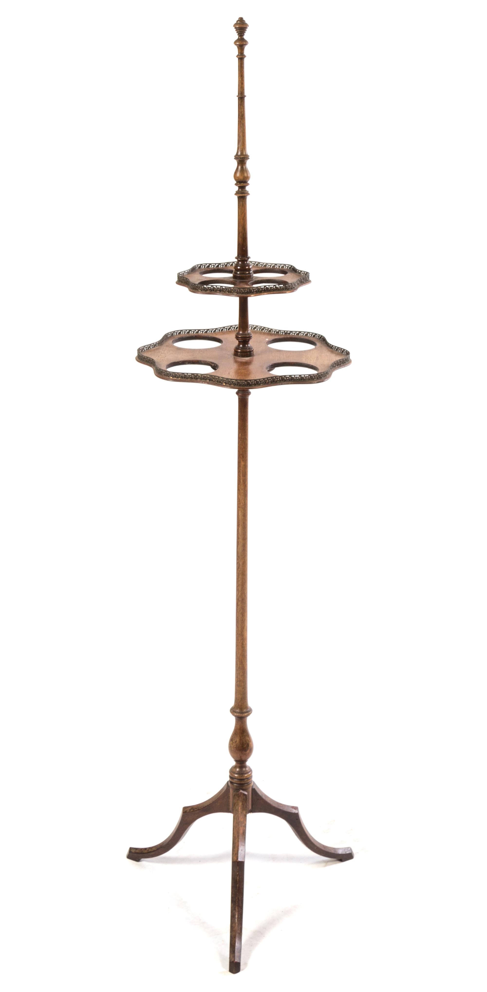 A Tripod Serving Stand. Height 57 1/4 inches.