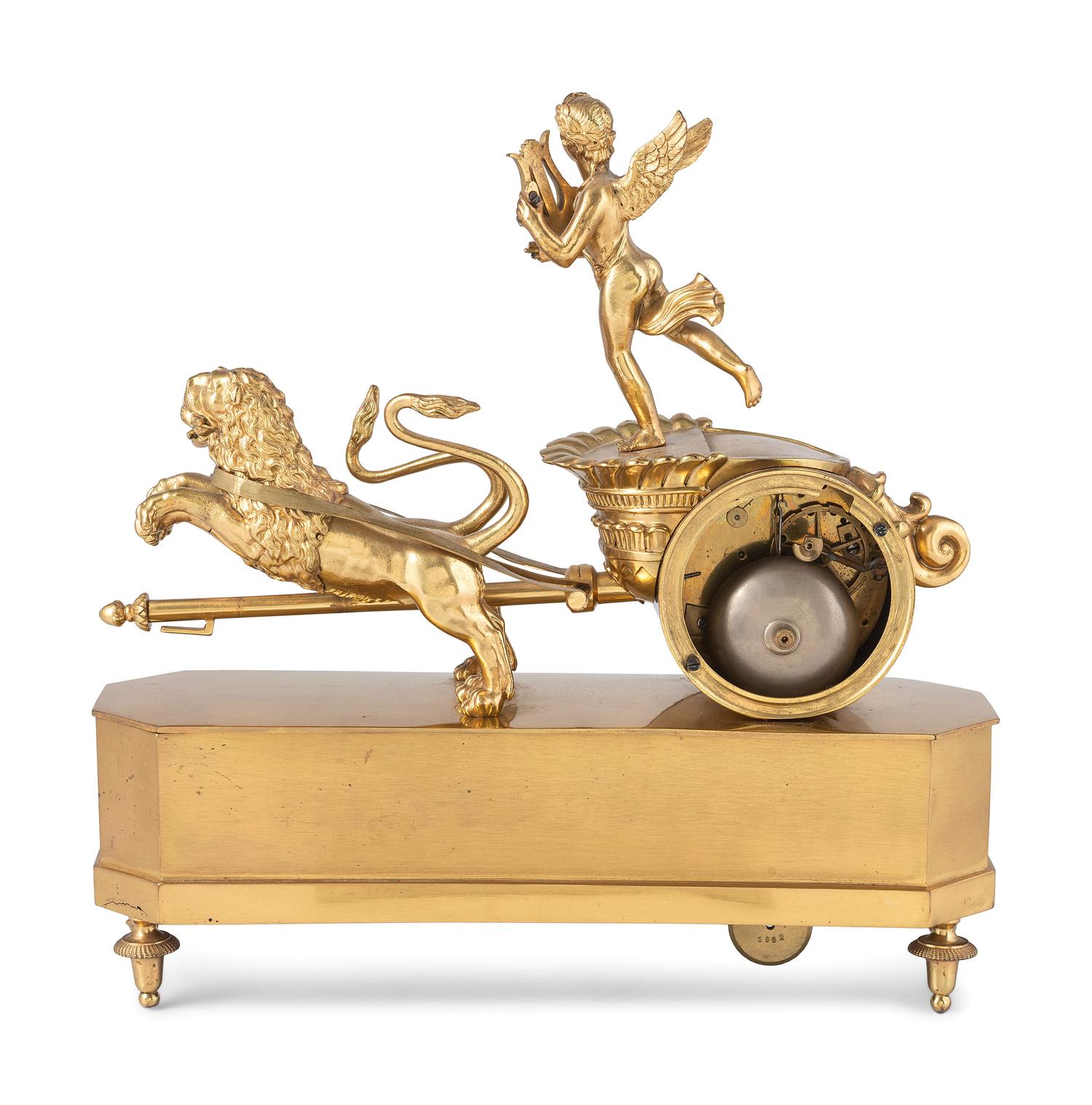 A French Ormolu Mantle Clock in the Form of a Chariot with Apollo and Lions