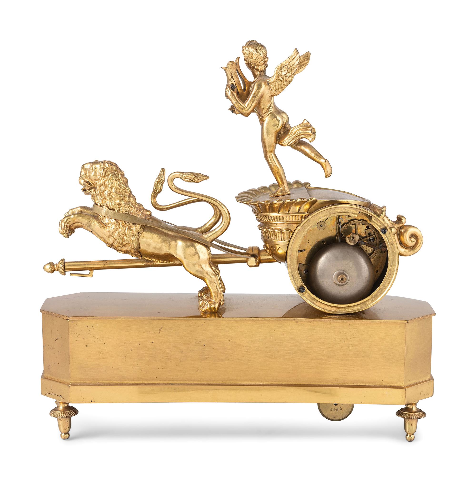 A French Ormolu Mantle Clock in the Form of a Chariot with Apollo and Lions