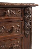 A Spanish Carved Oak Chest of Drawers