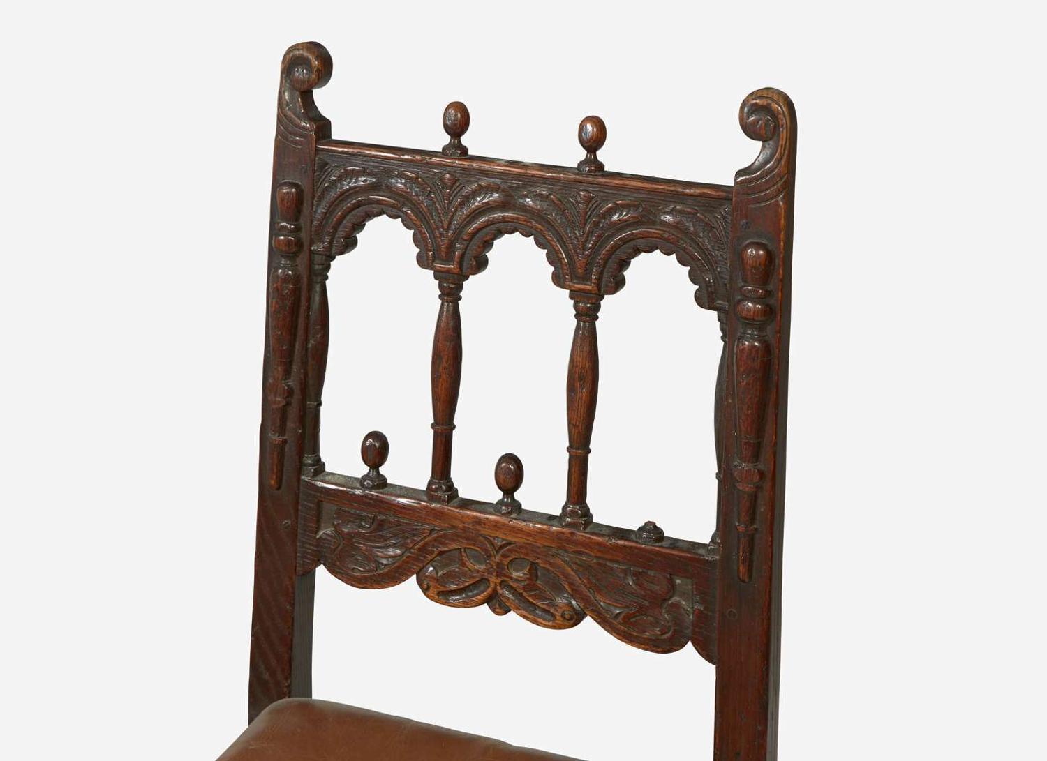 An assembled group of eight Baroque Revival oak and walnut dining chairs, late 19th / early 20th century