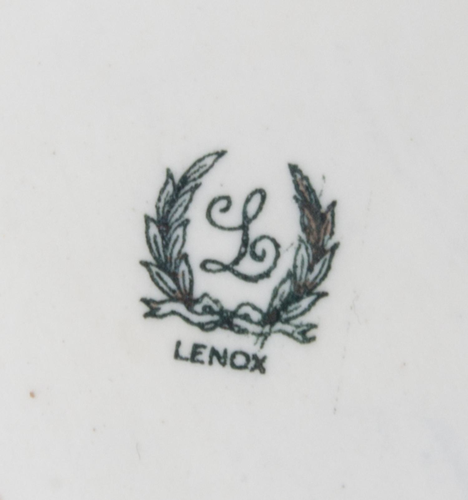 A Lenox Art Nouveau Silver Overlay Porcelain Mug Height 5 3/8 inches.