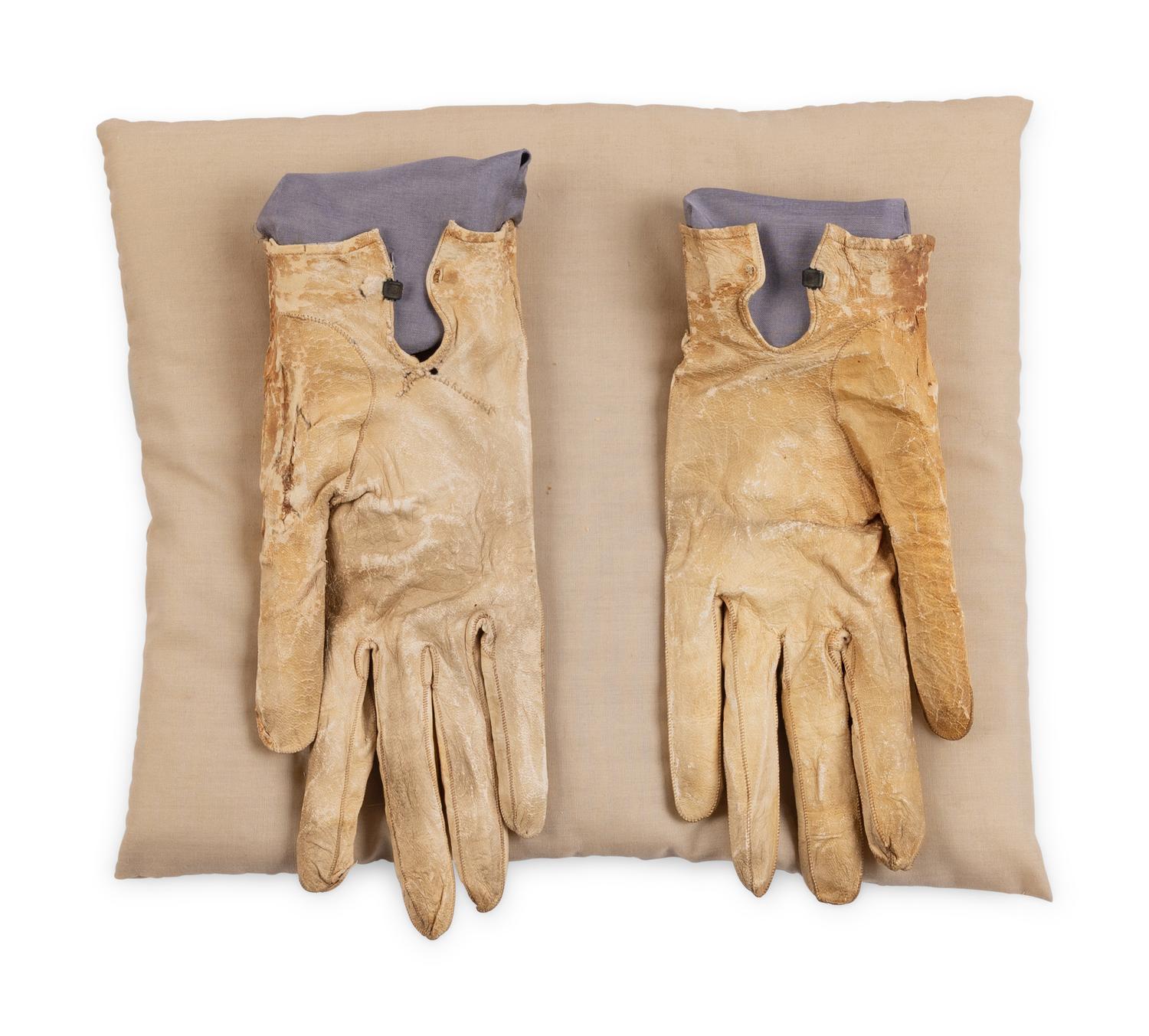 [LINCOLN ASSASSINATION]. A pair of stained leather gloves carried by President Abraham Lincoln at Ford's Theatre on the night of his assassination, 14 April 1865.