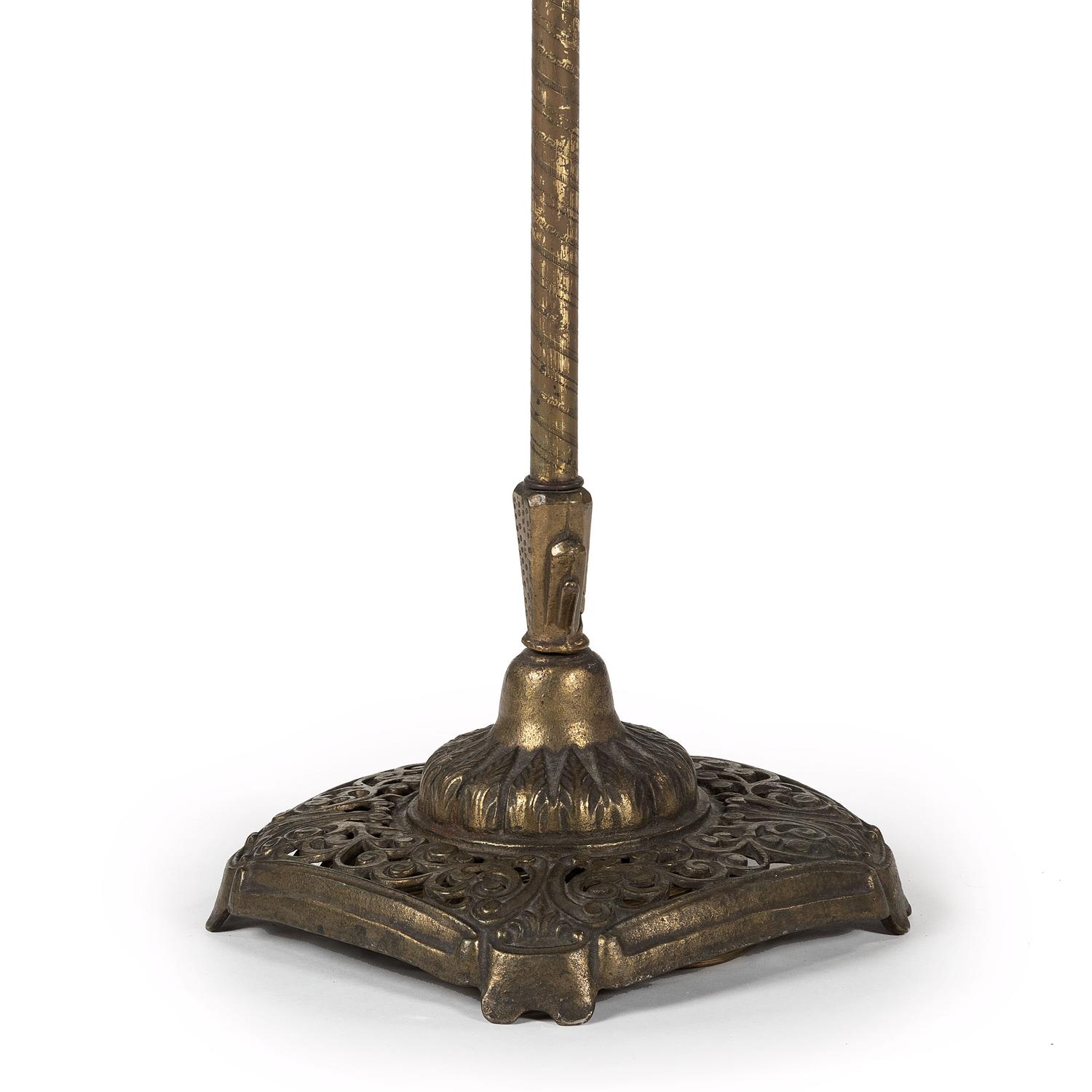 A Cast Metal Floor Lamp with a Leather Shade