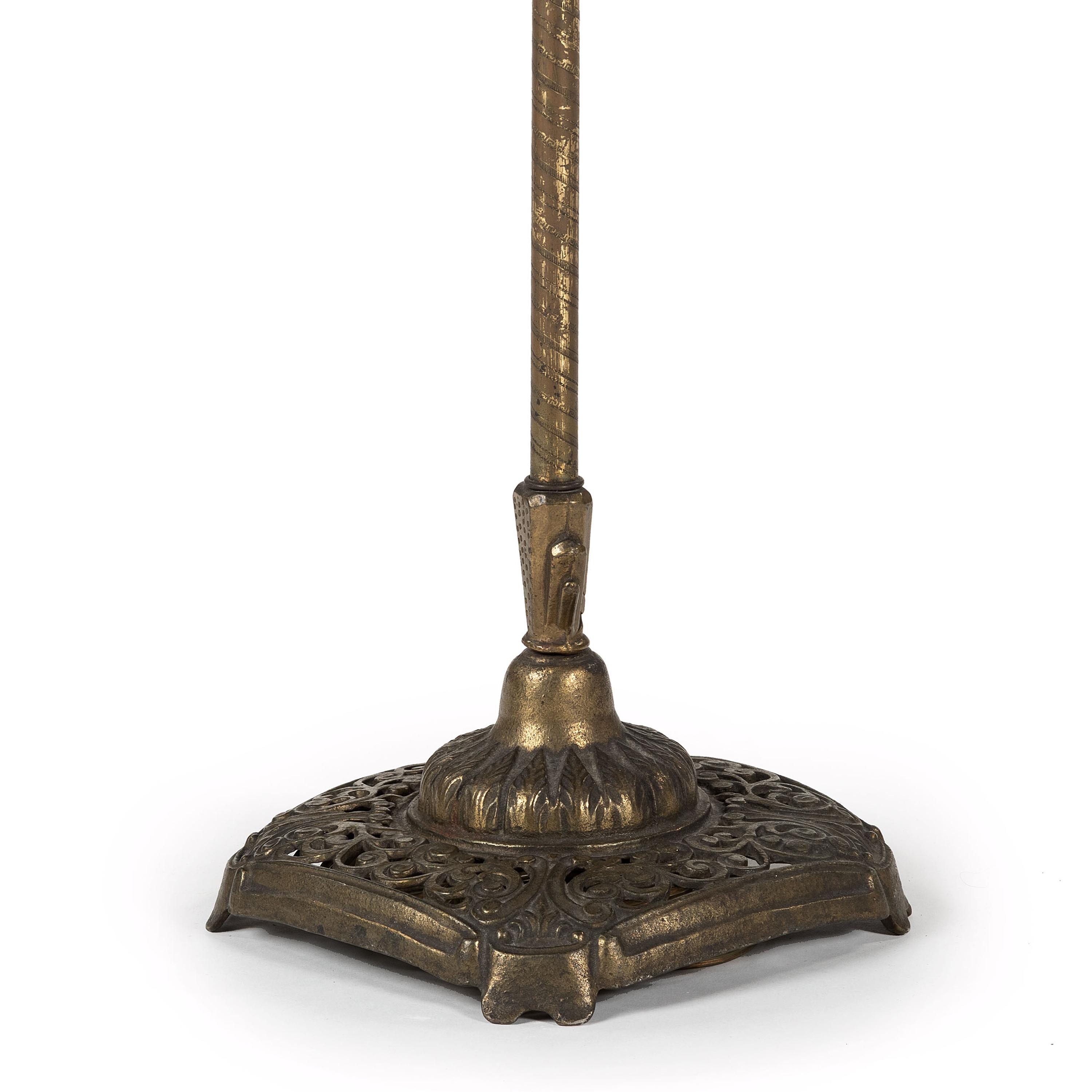 A Cast Metal Floor Lamp with a Leather Shade