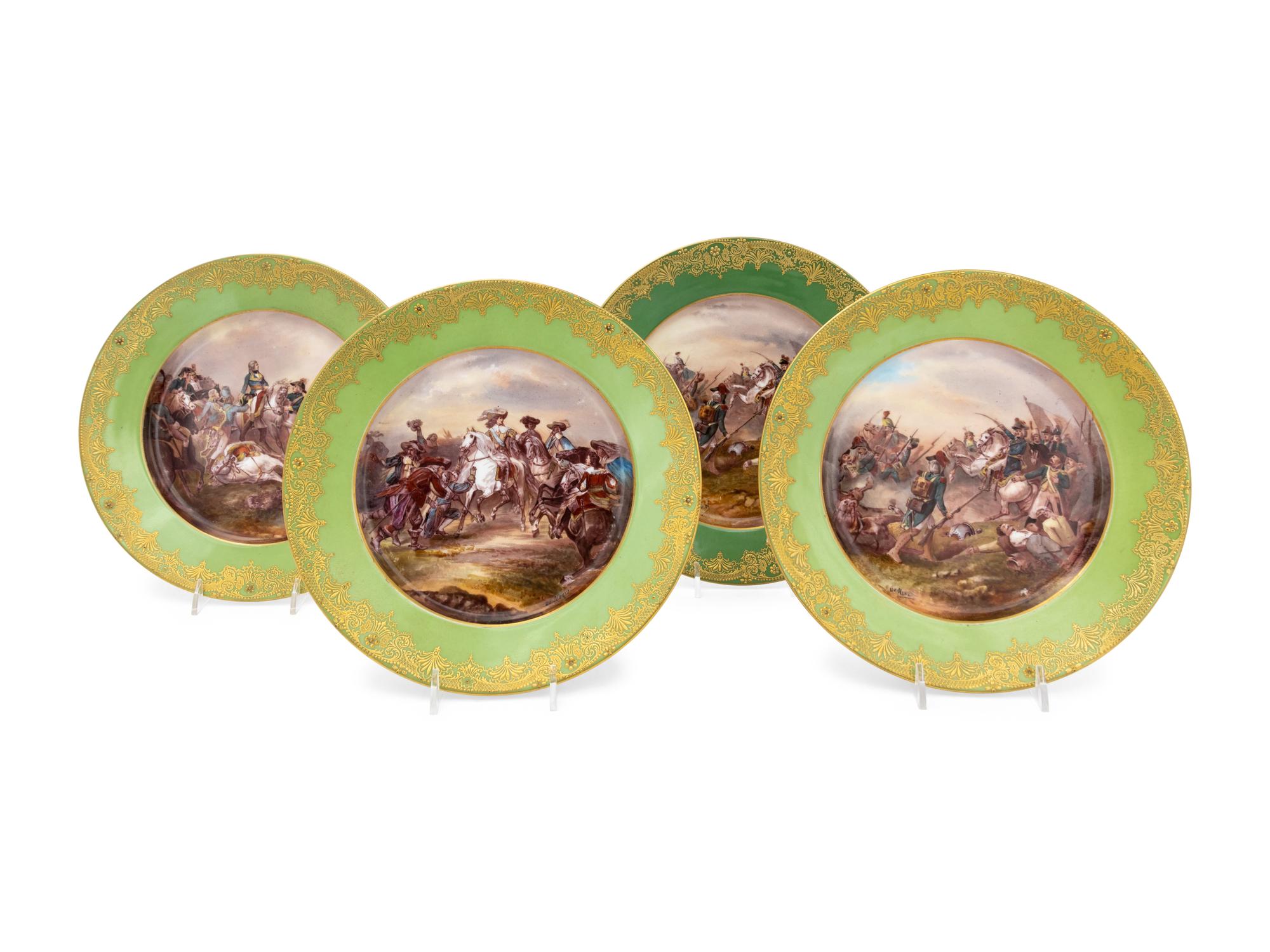 A Set of Four Limoges Porcelain Cabinet Plates