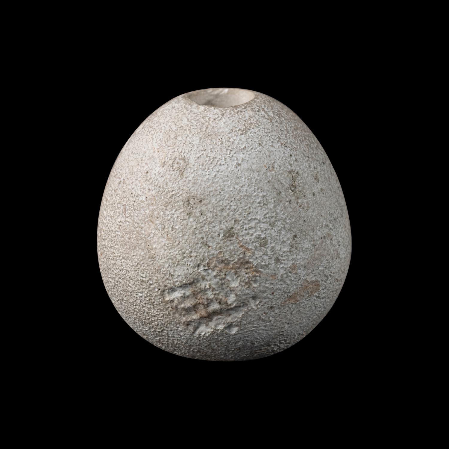 An Egyptian Limestone Mace Head