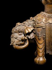 An Embellished Bronze Figure of an Elephant and Vase