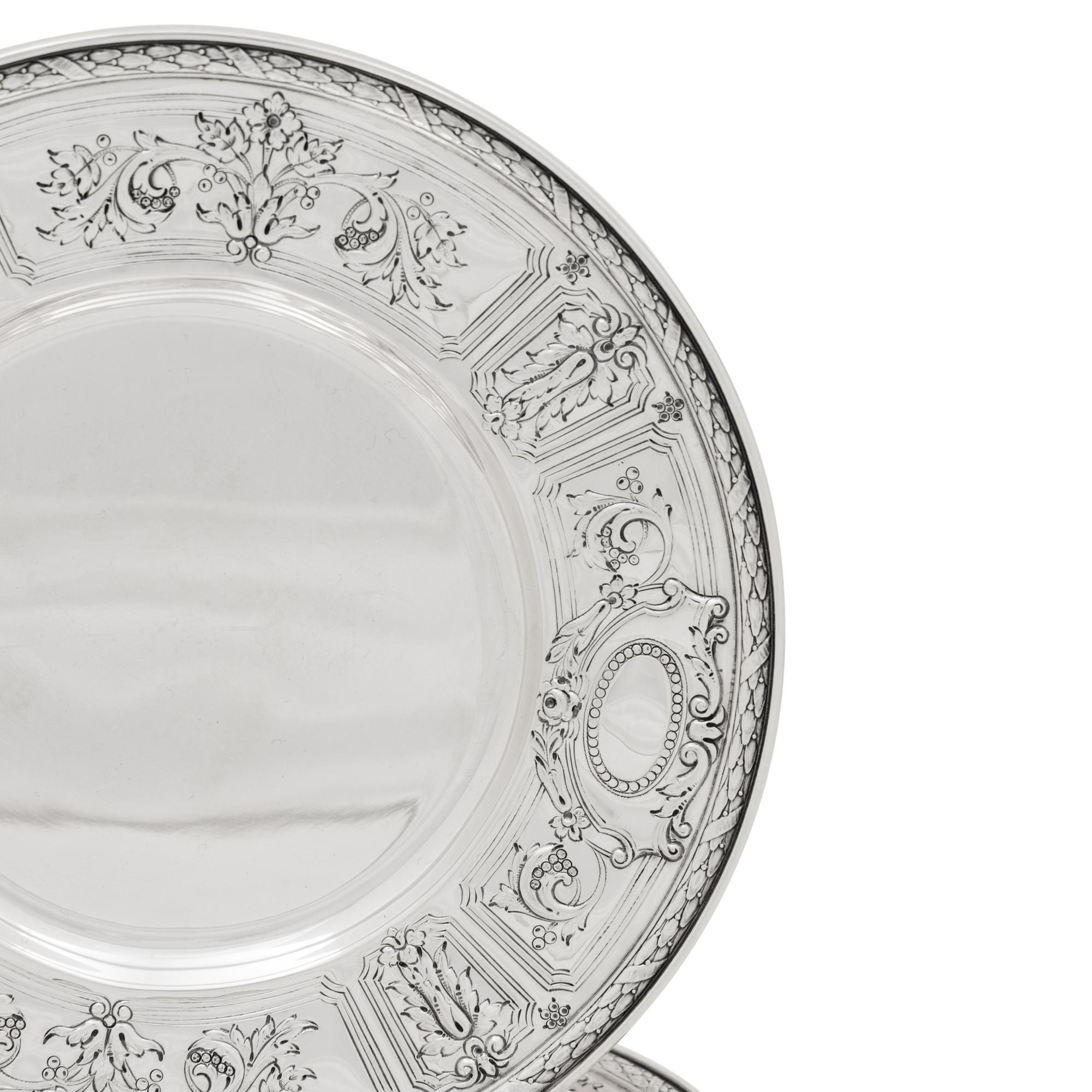 A Set of Twelve American Silver Dessert Plates