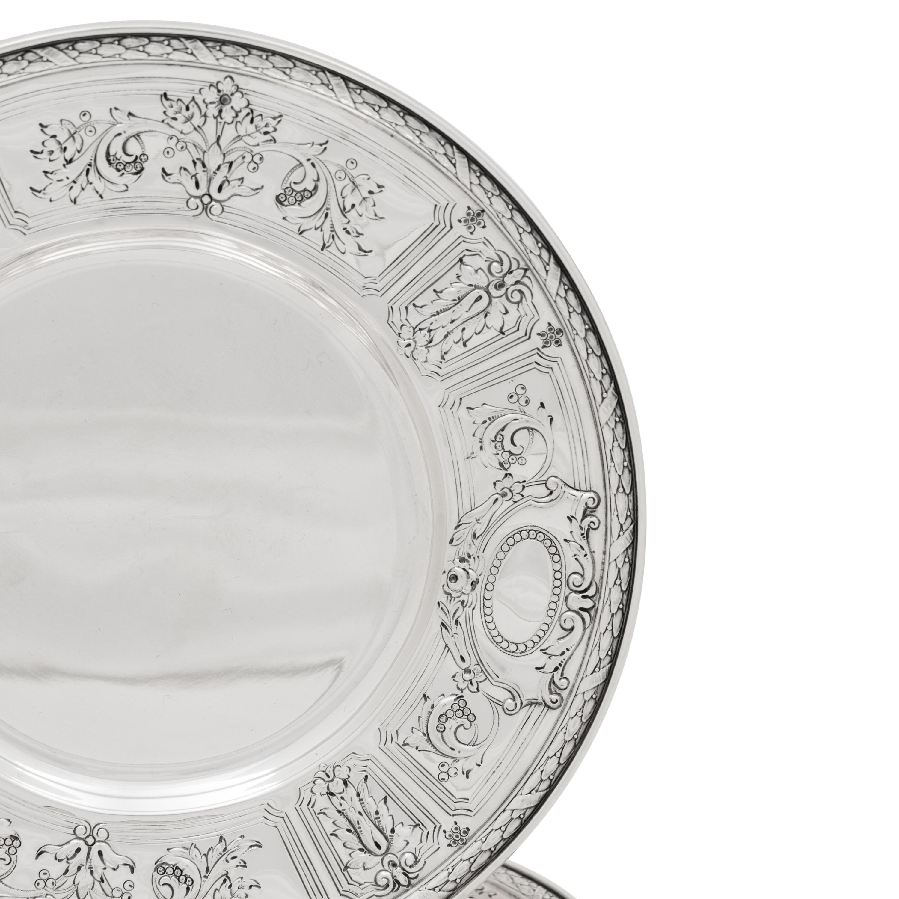 A Set of Twelve American Silver Dessert Plates