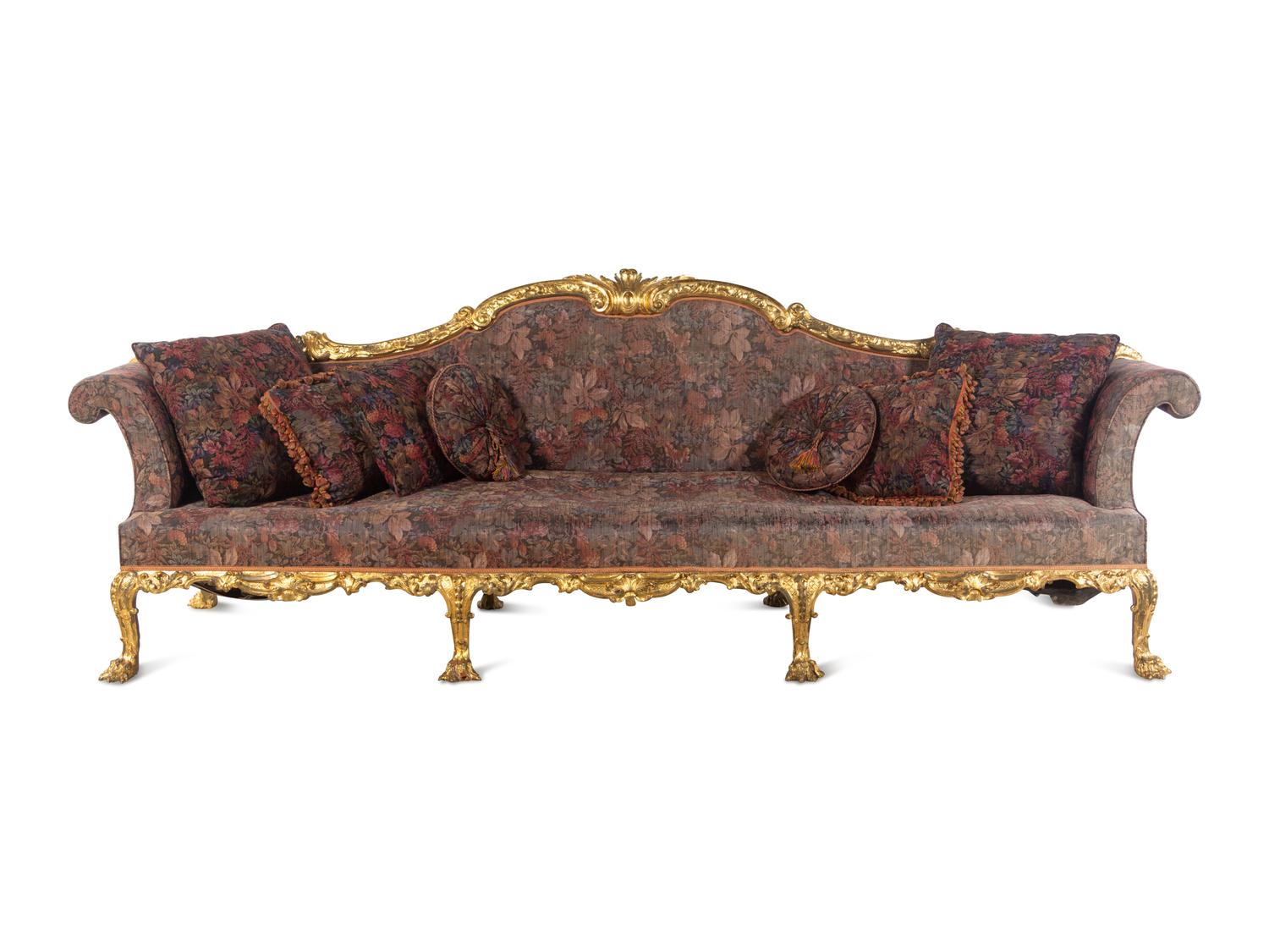 A Pair of George II Oversized Giltwood Canapés