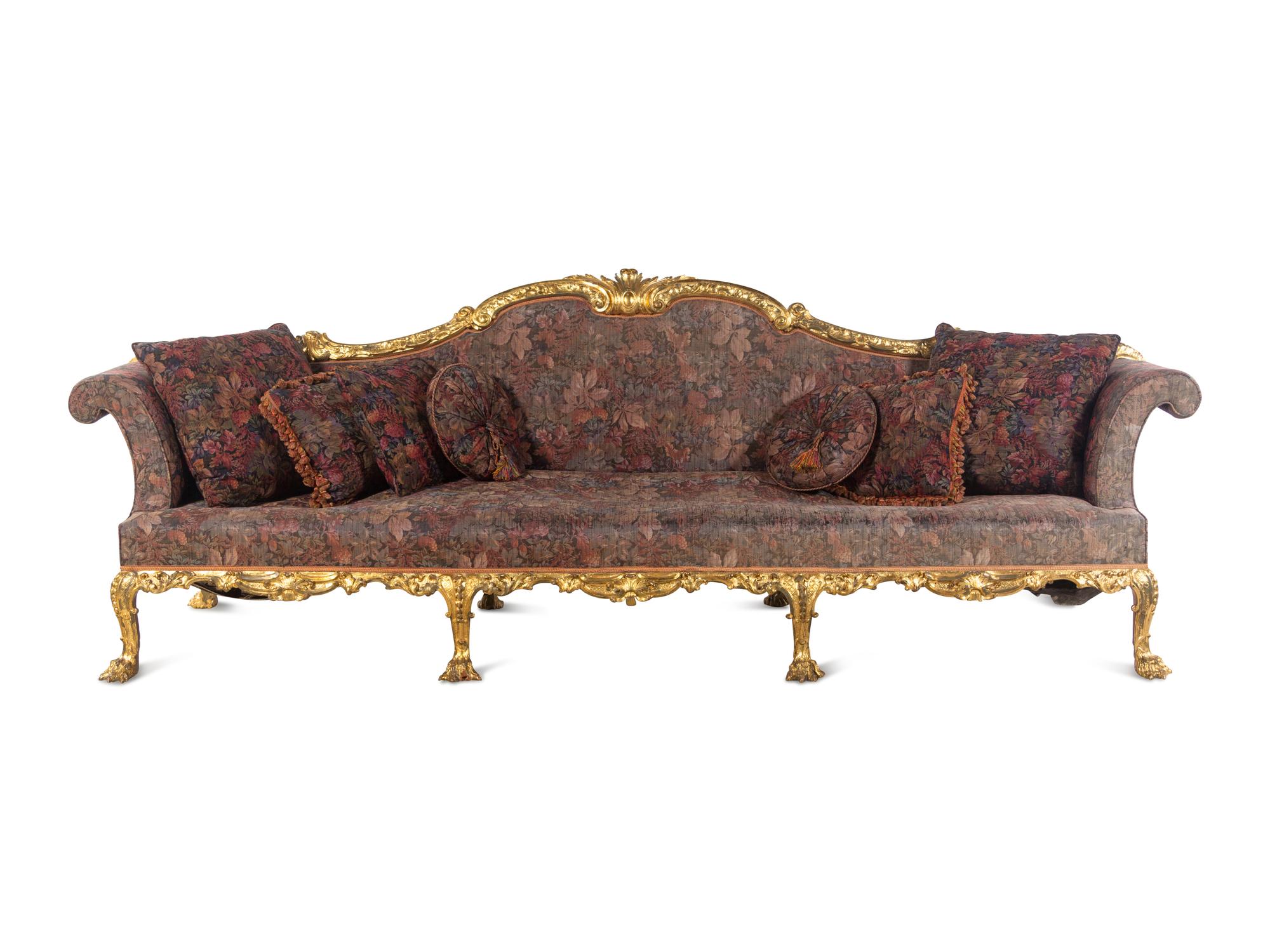 A Pair of George II Oversized Giltwood Canapés