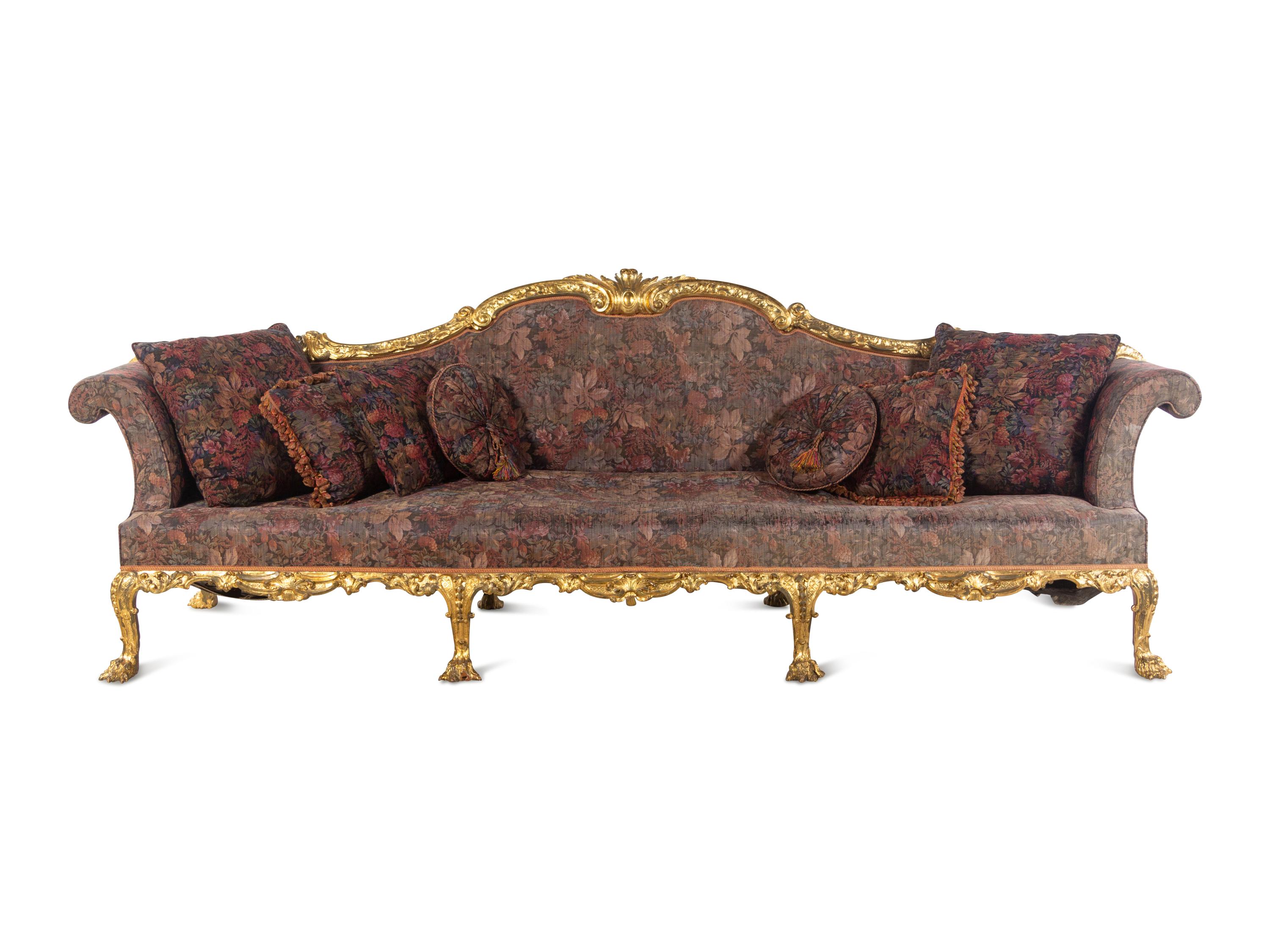 A Pair of George II Oversized Giltwood Canapés