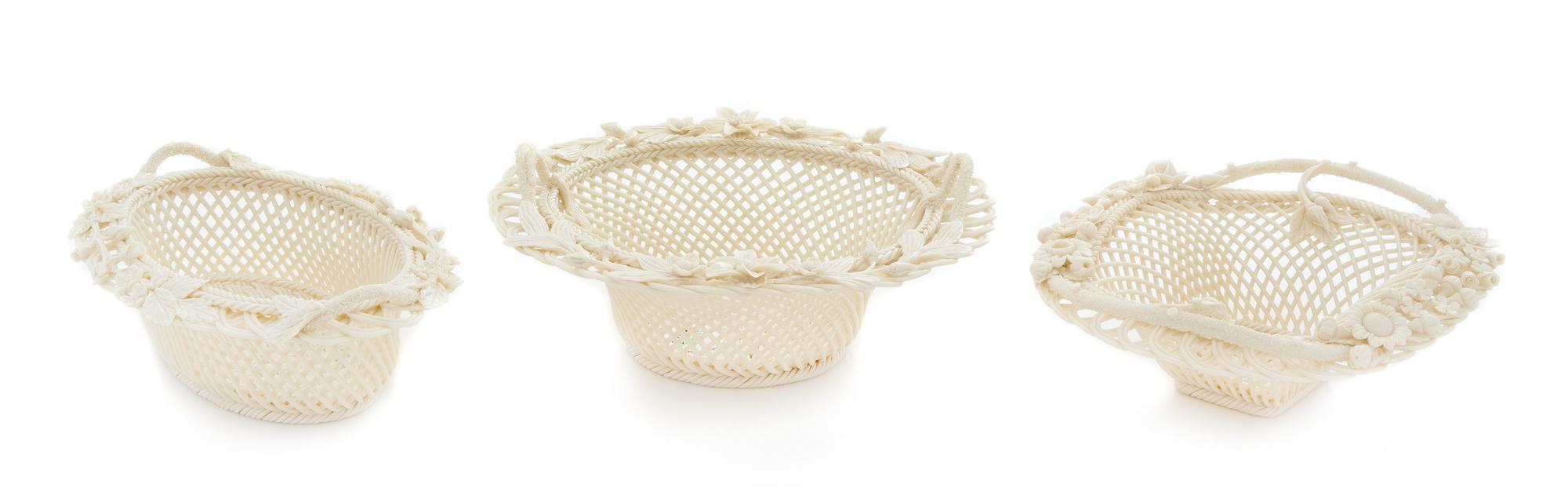 Three Belleek Baskets Width of widest 8 1/4 inches.