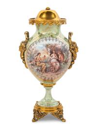 A Vienna Style Gilt Metal Mounted Porcelain Covered Urn