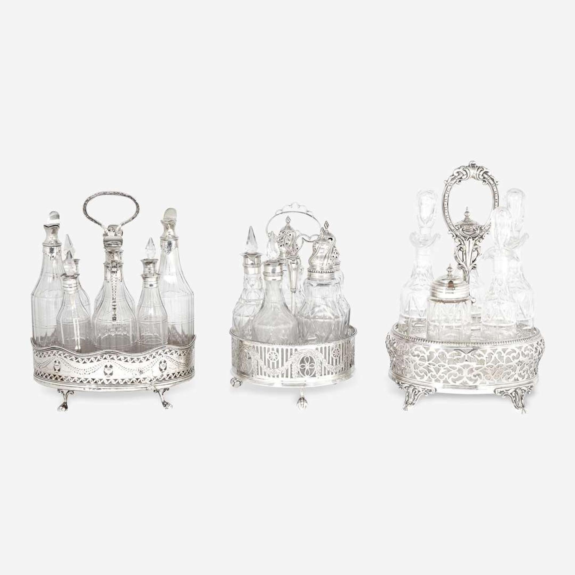 A group of three George III / Victorian sterling silver, silver plate, and glass cruet sets Various makers, late 18th / 19th century