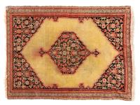 A Persian Wool Rug 2 feet 8 inches x 2 feet.