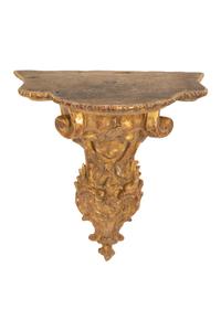 A Pair of Tin-Glazed Earthenware Wall Brackets, and Two Giltwood Wall Brackets