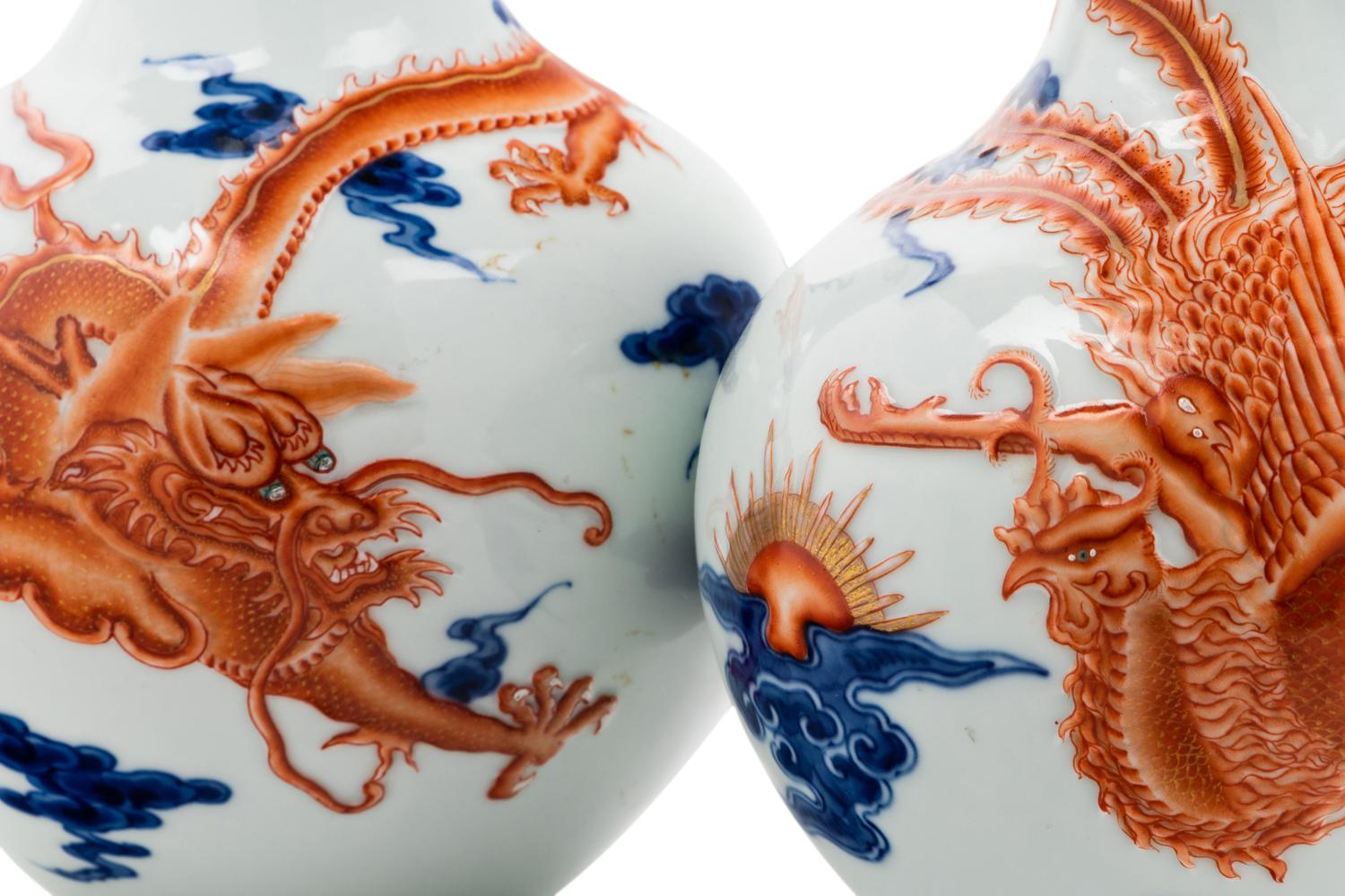 A Pair of Chinese Iron Red Decorated and Underglaze Blue Porcelain Bottle Vases