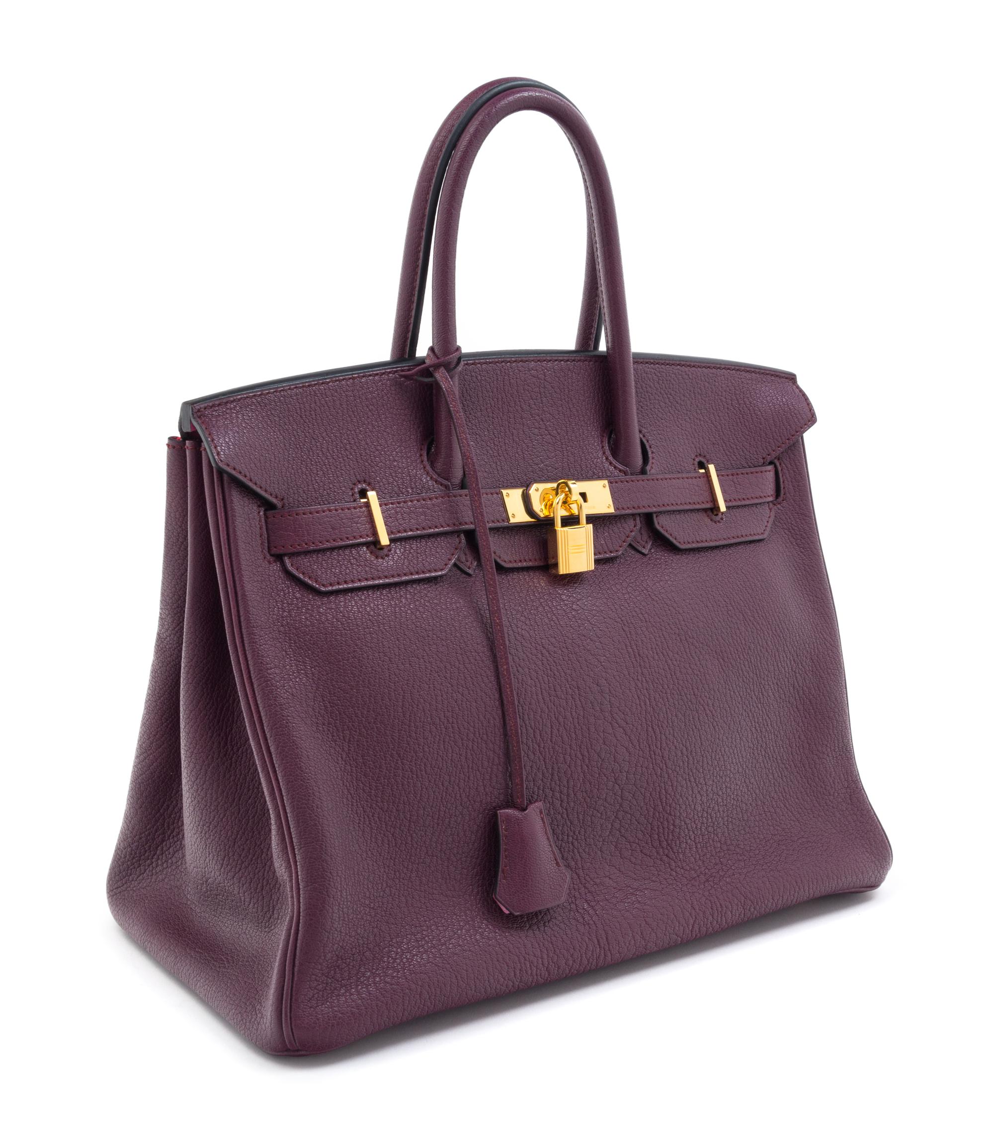 An Hermes Bicolor Raisin Togo 35cm Birkin Handbag, 14" x 10" x 7".