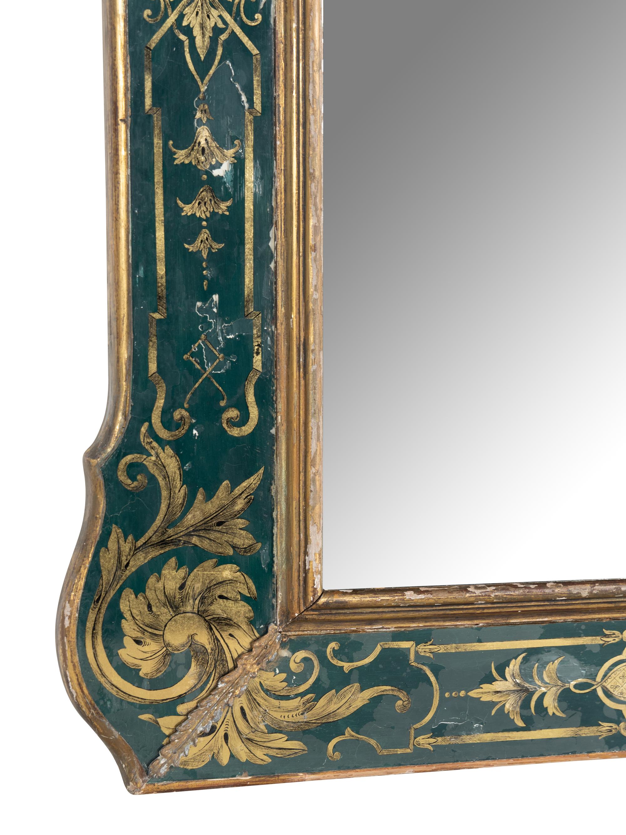 A Baroque Style Reverse Painted Glass and Giltwood Mirror