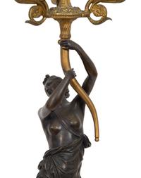 A Pair of French Empire Style Gilt and Patinated Bronze Figural Four-Light Candelabra