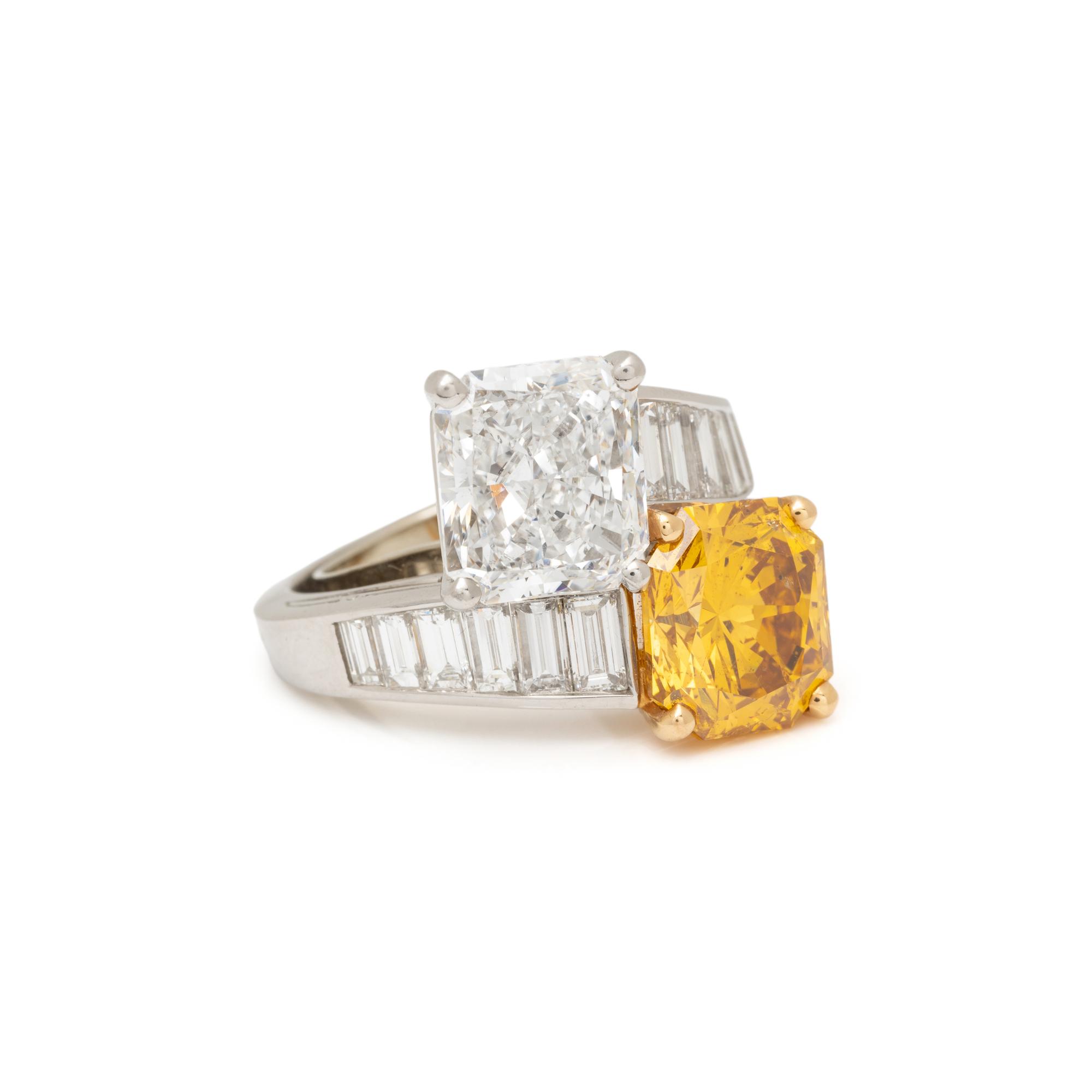 OSCAR HEYMAN, FANCY DEEP ORANGE-YELLOW DIAMOND AND DIAMOND RING