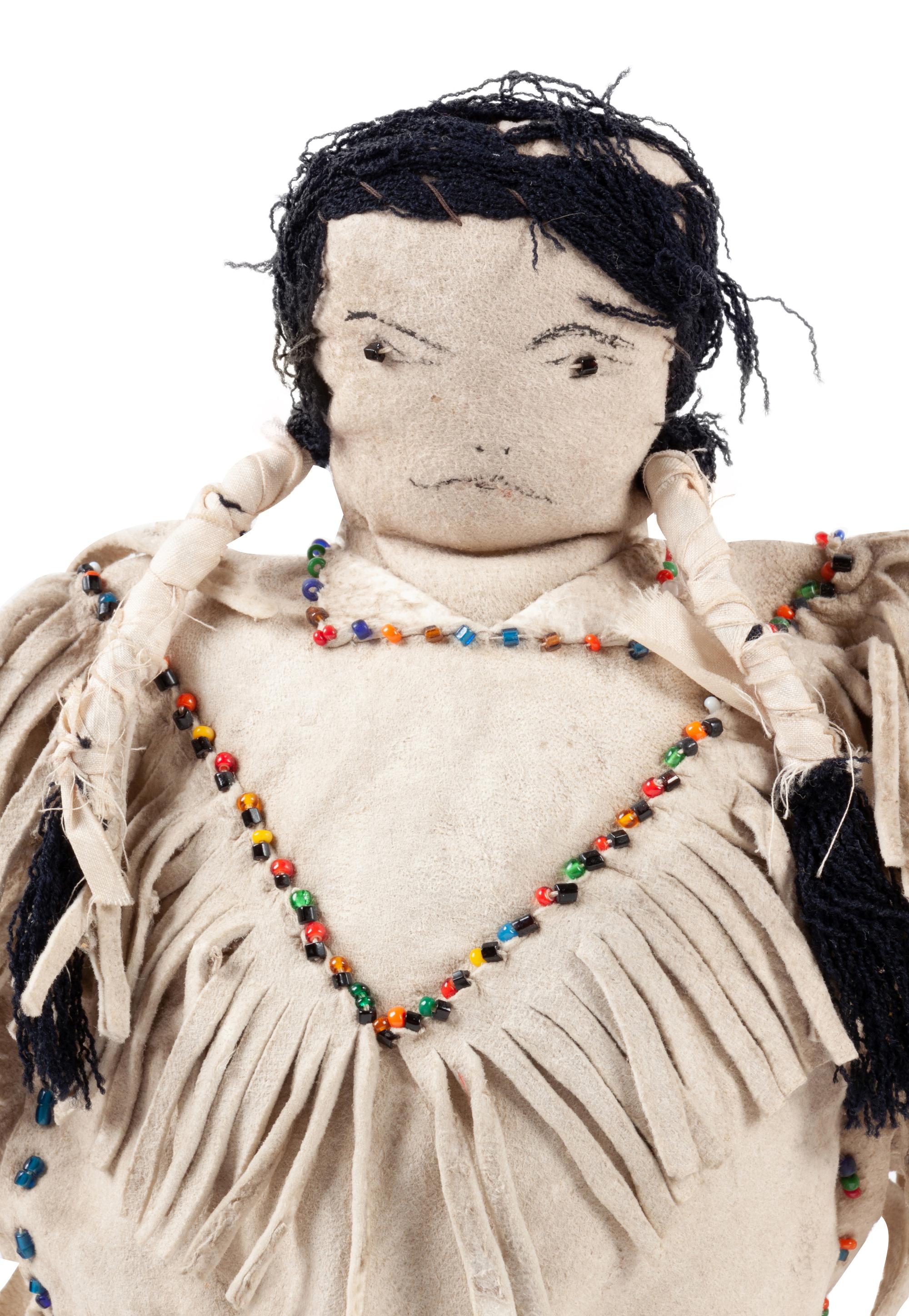 Apache and Plains Beaded Hide Dolls