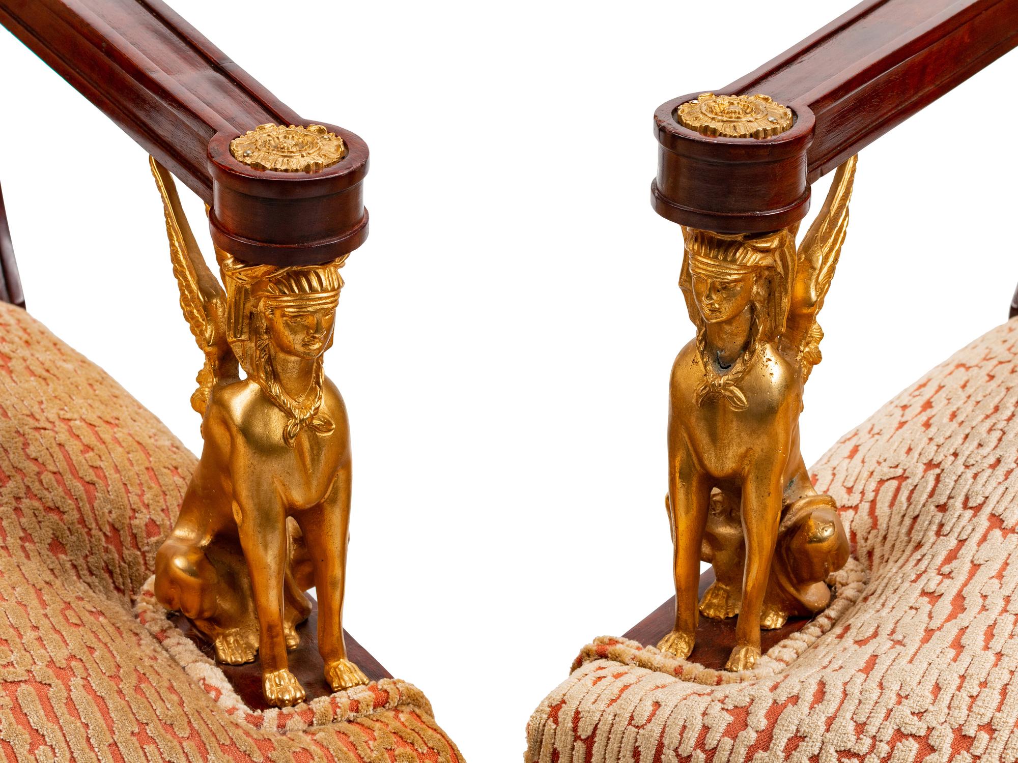 A Pair of Empire Style Gilt-Bronze-Mounted Mahogany Fauteuils