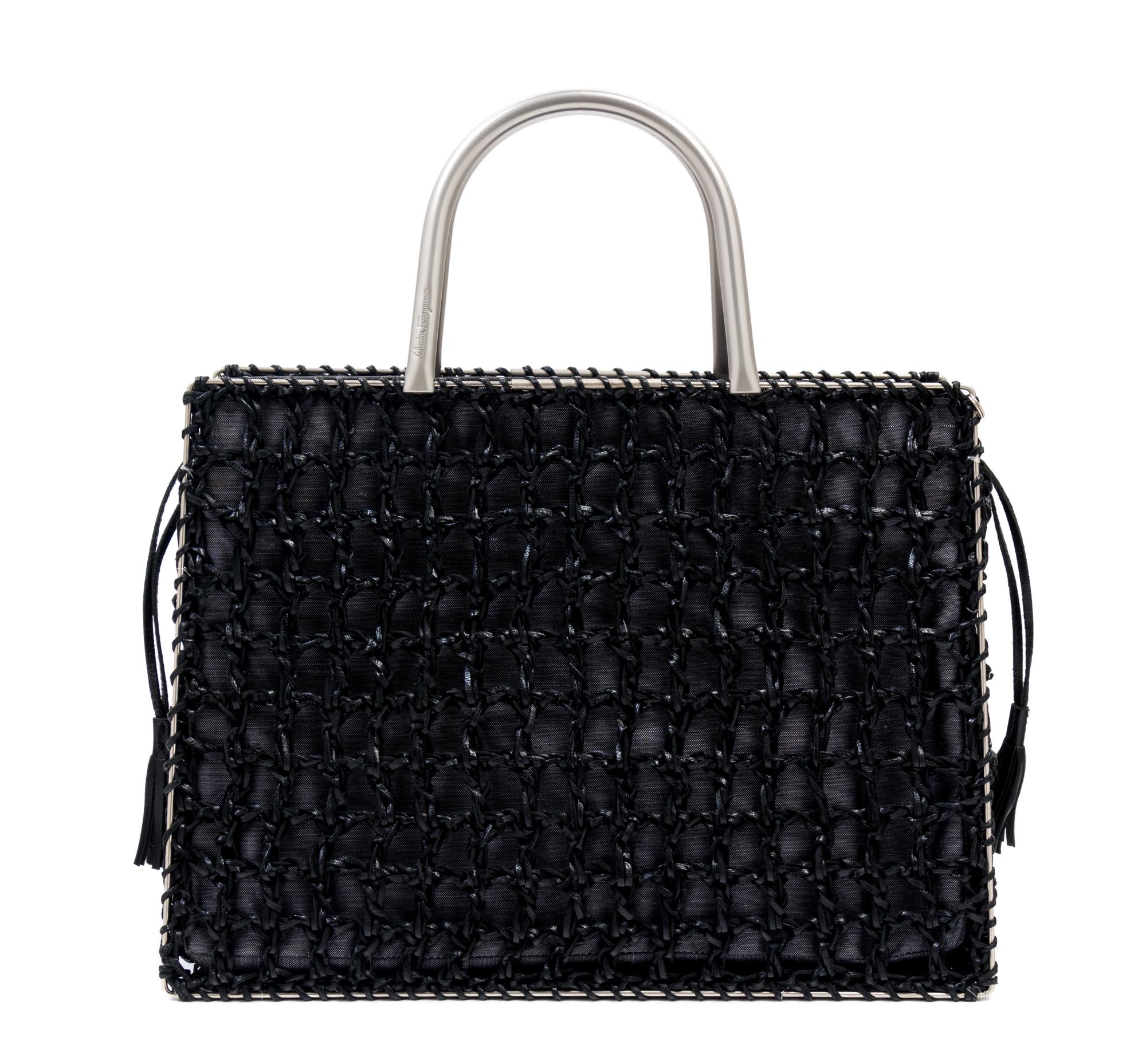 A Salvatore Ferragamo Black Leather Basket Weave Tote, 11" x 8" x 4.5"; Handle drop: 4".