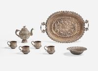 A Middle Eastern seven-piece silver tea service, probably 20th century