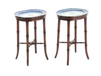 A Pair of Chinese Export Porcelain Armorial Platters Raised on Later Mahogany Stands