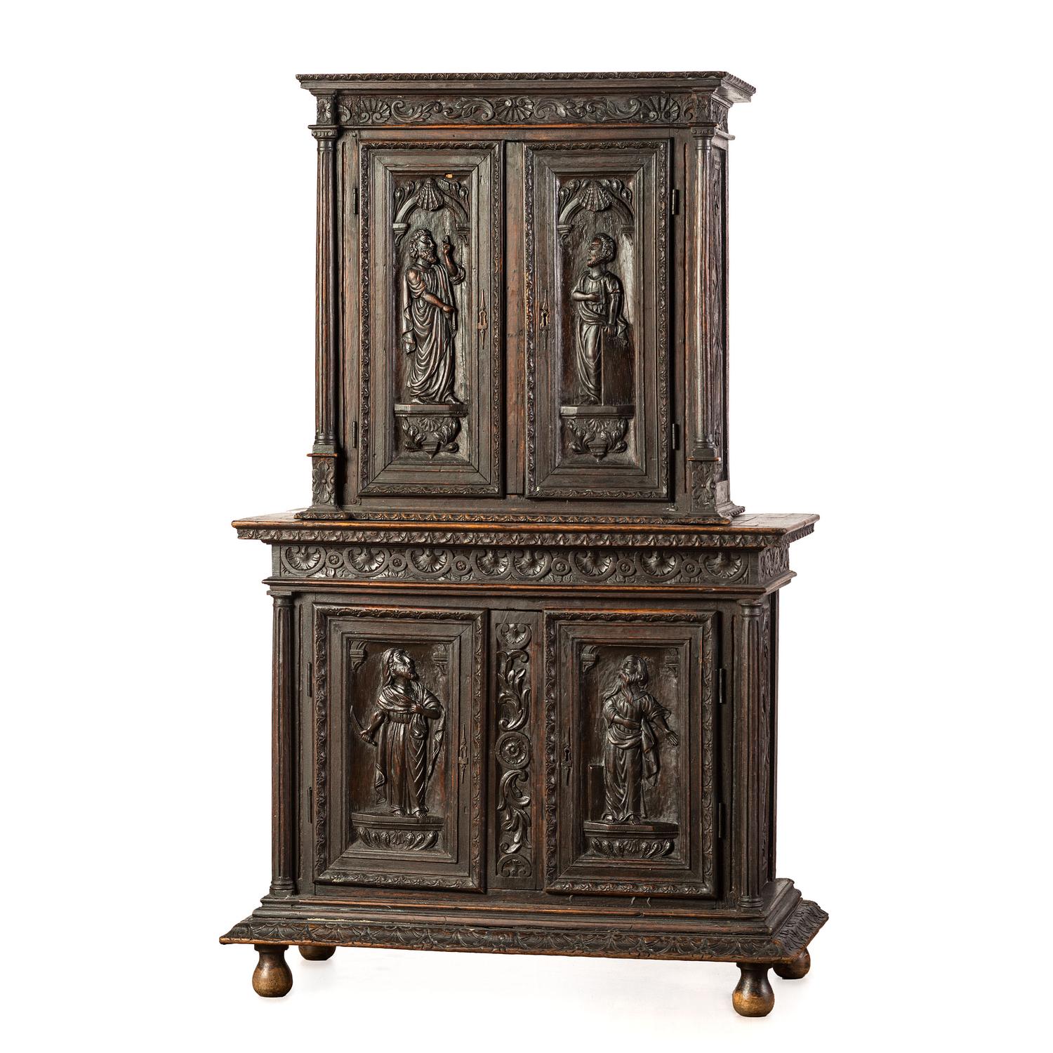 A John Scott Bradstreet & Co. Gothic Revival Carved Oak Cupboard