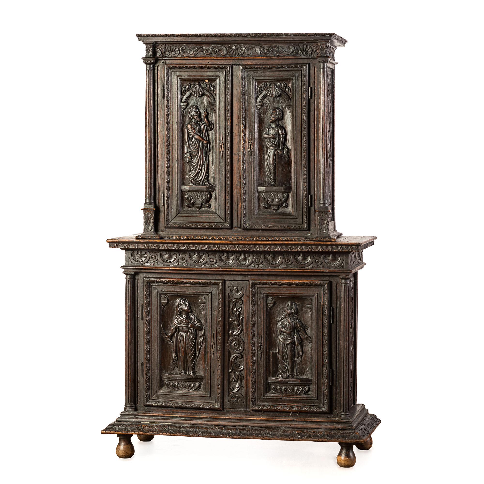 A John Scott Bradstreet & Co. Gothic Revival Carved Oak Cupboard