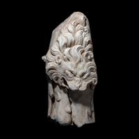 A Roman Marble Support in the form of the Nemean Lion Skin and Club of Hercules