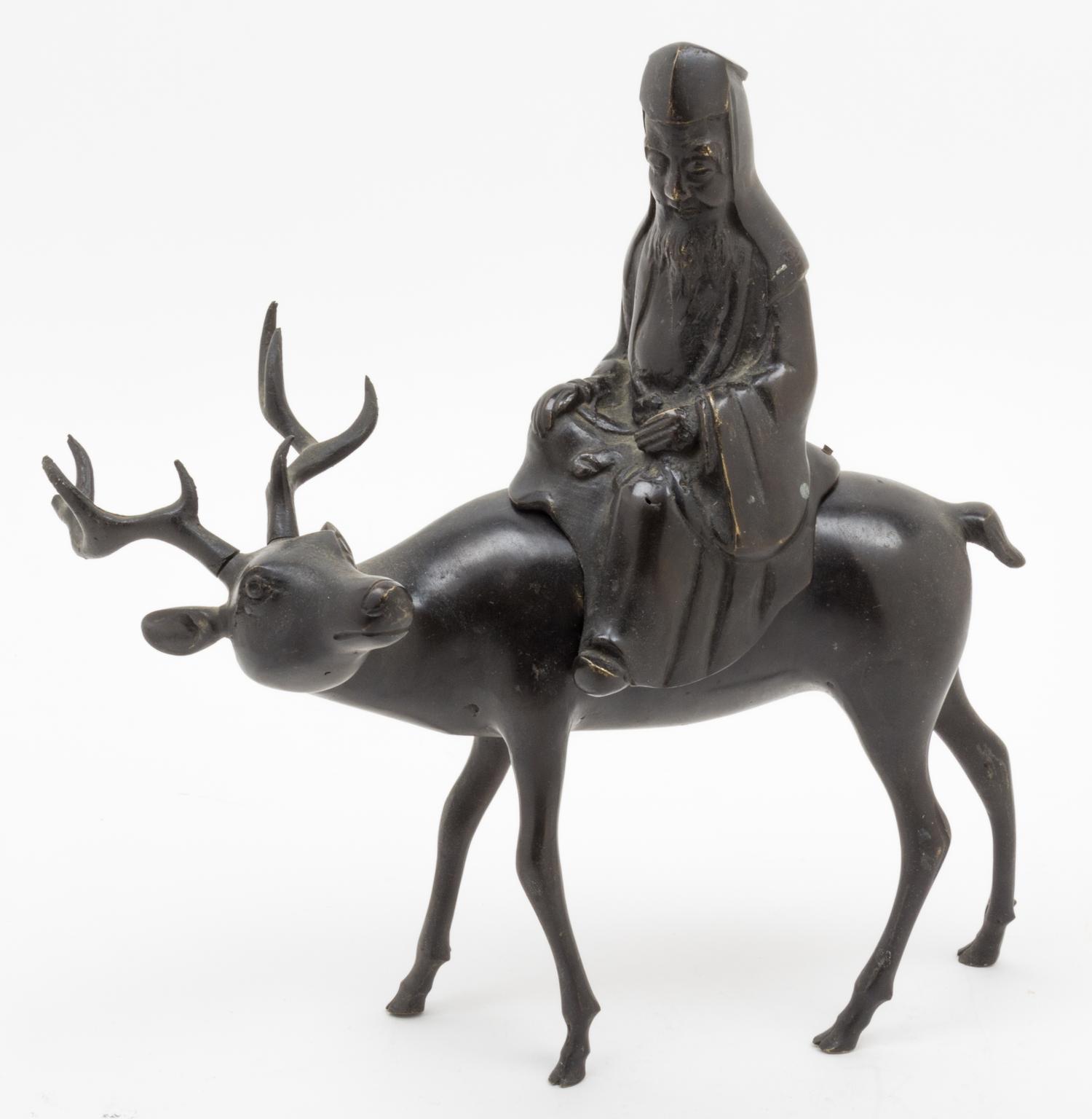 A Bronze Figural Censer Length 11 1/2 inches.